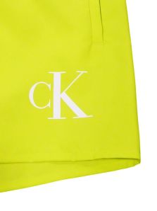 ¿Sol a la vista? Este bañador Calvin Klein limón no puede faltar.