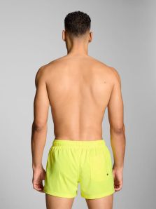 Descubre bañador amarillo limón Puma en oferta, ideal piscina y playa.