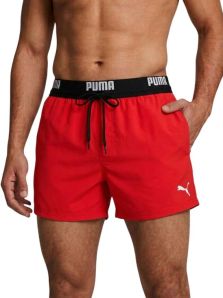 Detalle cinturilla elástica vista con logo PUMA sobre bañador rojo hombre