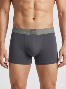 Detalle de ajuste ergonómico en bóxer Jan Men color verde botella, microfibra suave sin costuras laterales.