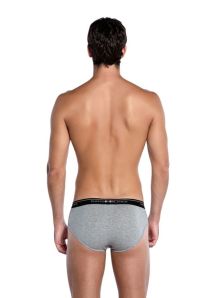Detalle de cintura elástica con logo en slip Basix colores lisos hombre
